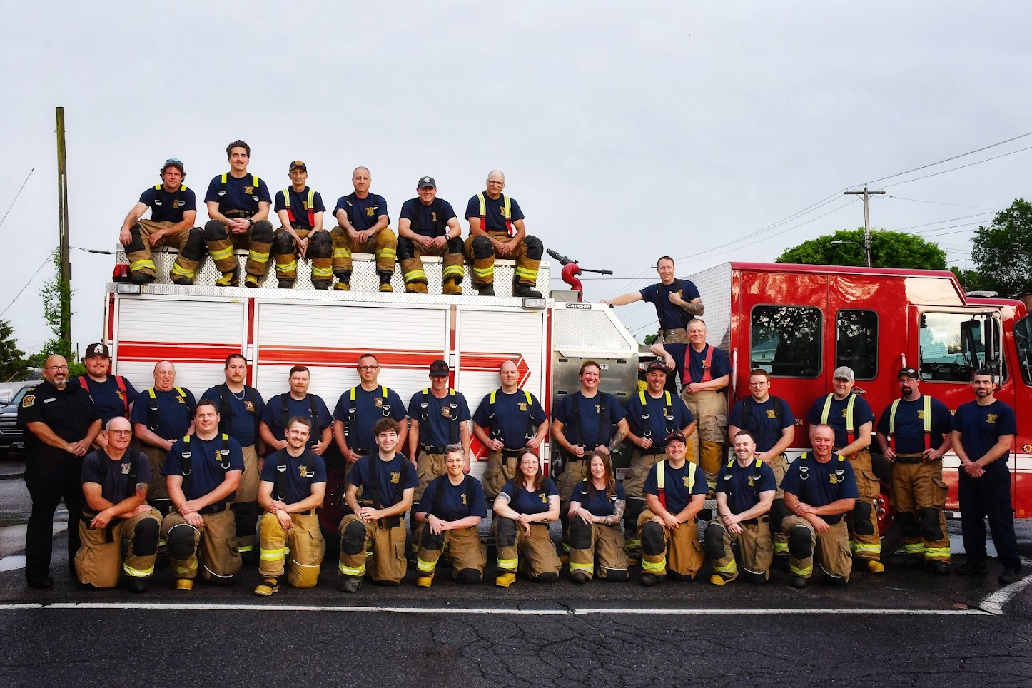 Entire Fire department members with truck