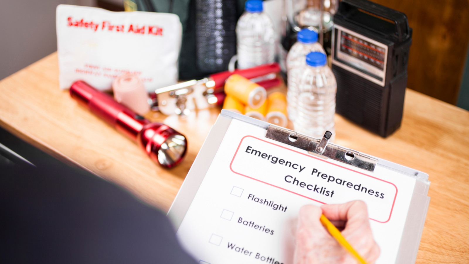 A checklist with emergency kit items