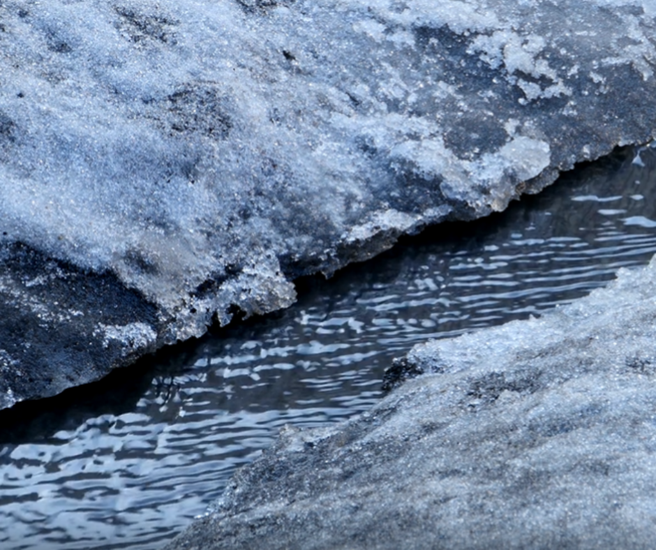 snow melting into a stream