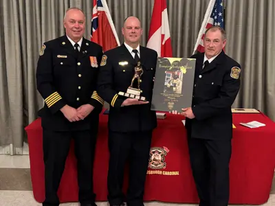 Chief Brian Moore, with Steve Roberts was honoured as the first-ever recipient of the Rainville Family Exemplary Firefighter Award in Memory of Lucas Champagne, recognizing his dedication to mentoring and teaching fellow firefighters, and Pete Rainville.