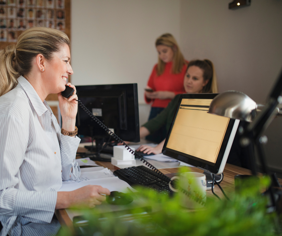 A staff member answering a phone call